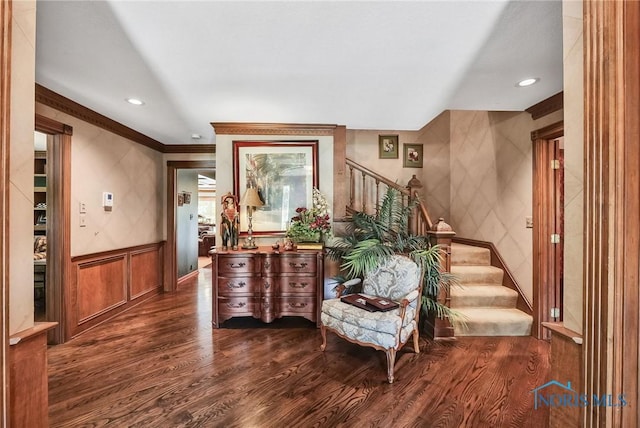 25840 W River Rd, Perrysburg, OH 43551 - foyer entrance with dark wood-type flooring, stairway, crown molding, recessed lighting, and wainscoting