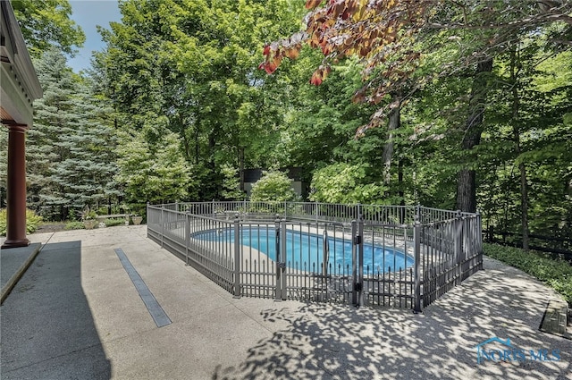 25840 W River Rd, Perrysburg, OH 43551 - view of swimming pool featuring a patio