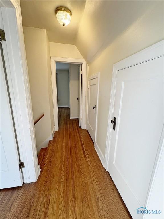 932 N Grove St, Bowling Green, OH 43402 - corridor with wood finished floors and vaulted ceiling