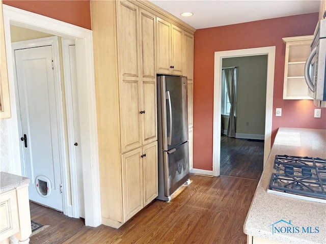 932 N Grove St, Bowling Green, OH 43402 - kitchen with stainless steel appliances, dark wood-style floors, baseboards, recessed lighting, and light brown cabinetry