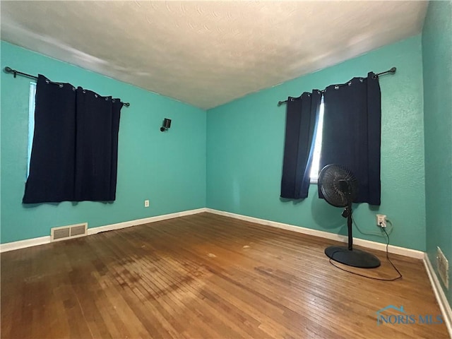 3030 Colby Dr, Toledo, OH 43614 - spare room with hardwood / wood-style floors and baseboards