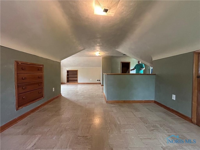 3030 Colby Dr, Toledo, OH 43614 - additional living space featuring lofted ceiling and baseboards