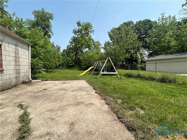 3030 Colby Dr, Toledo, OH 43614 - view of yard with a playground and a patio