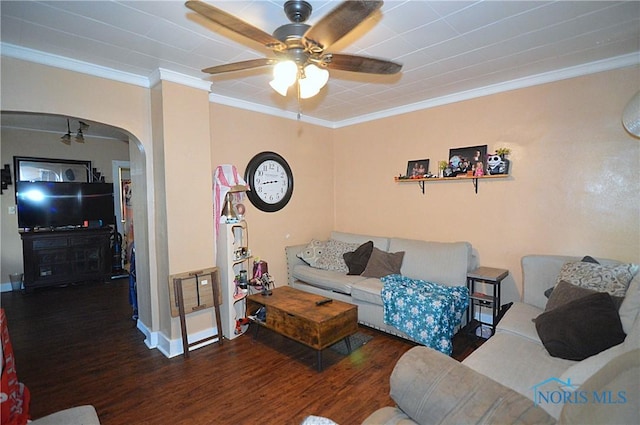 2617 York St, Toledo, OH 43605 - living room featuring a ceiling fan, wood finished floors, crown molding, arched walkways, and baseboards