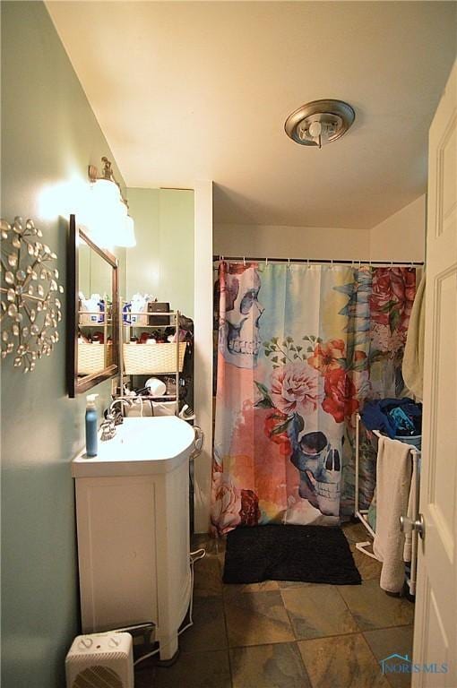 2617 York St, Toledo, OH 43605 - full bathroom with vanity, a shower with curtain, and tile patterned flooring