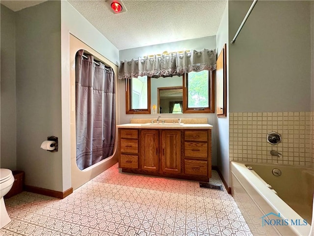 1508 Darbyshire Dr, Defiance, OH 43512 - bathroom featuring toilet, vanity, a garden tub, a shower with shower curtain, and a textured ceiling