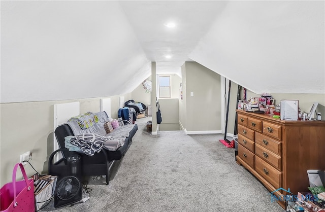 224 Elm St, Rossford, OH 43460 - carpeted bedroom featuring lofted ceiling and baseboards