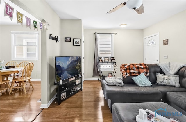 224 Elm St, Rossford, OH 43460 - living room with a ceiling fan, hardwood / wood-style floors, and baseboards