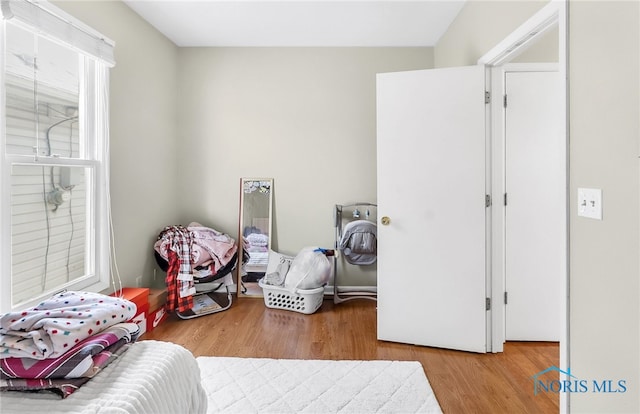 224 Elm St, Rossford, OH 43460 - bedroom featuring wood finished floors