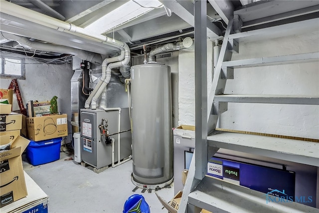 224 Elm St, Rossford, OH 43460 - utility room featuring water heater