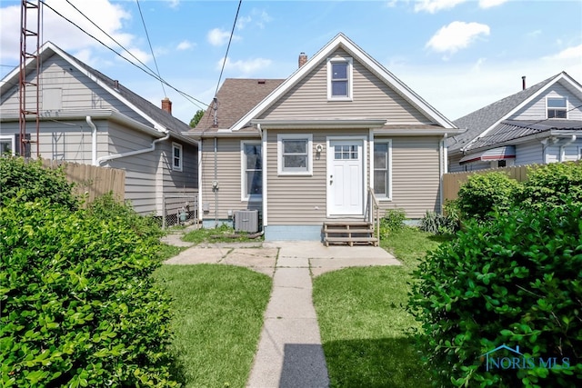 224 Elm St, Rossford, OH 43460 - view of front of property featuring entry steps and central air condition unit