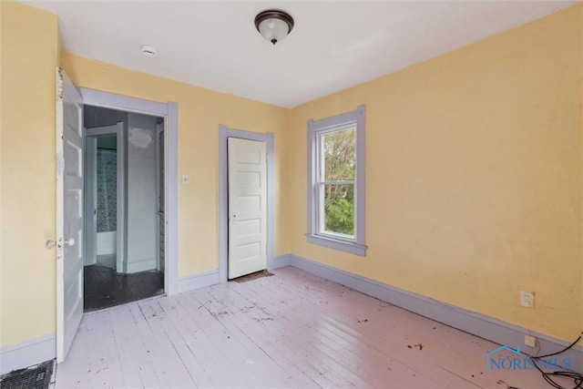 715 Nicholas St, Toledo, OH 43609 - empty room featuring hardwood / wood-style flooring and baseboards