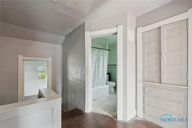 715 Nicholas St, Toledo, OH 43609 - full bath with wood finished floors, toilet, and vanity