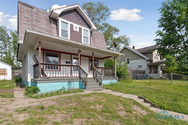 715 Nicholas St, Toledo, OH 43609 - view of front of home with a porch