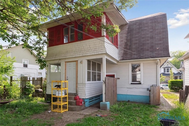 715 Nicholas St, Toledo, OH 43609 - back of house featuring a shingled roof and entry steps