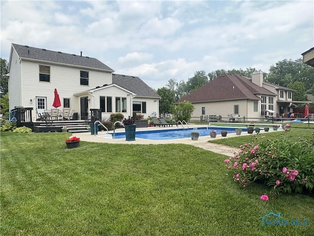 7663 Cortland Ct, Holland, OH 43528 - swimming pool featuring a wooden deck and a patio