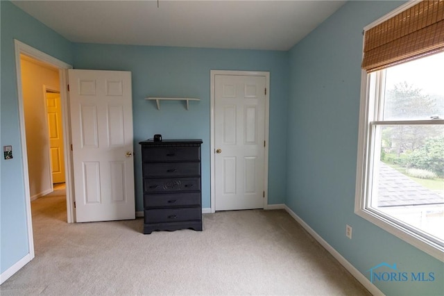 7663 Cortland Ct, Holland, OH 43528 - unfurnished bedroom with carpet flooring and baseboards