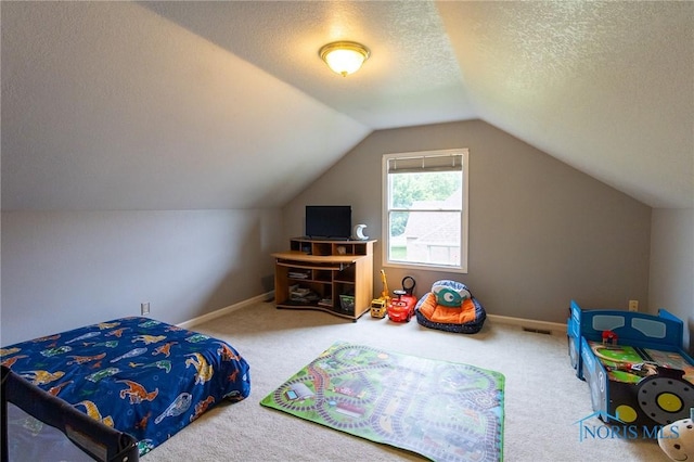 7663 Cortland Ct, Holland, OH 43528 - carpeted bedroom with a textured ceiling, lofted ceiling, and baseboards