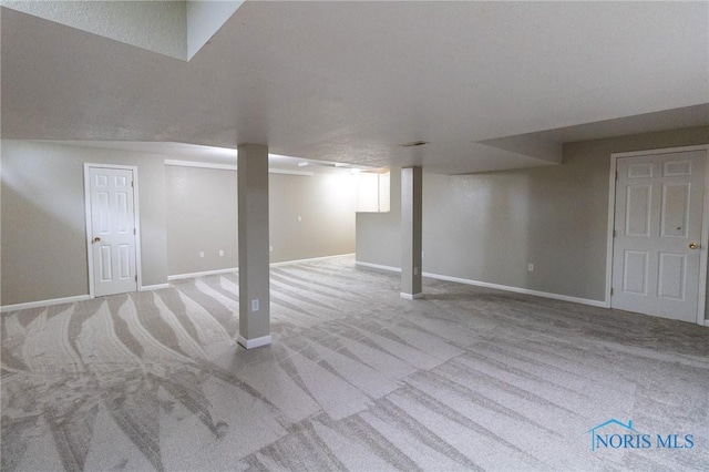7663 Cortland Ct, Holland, OH 43528 - finished below grade area featuring carpet and baseboards