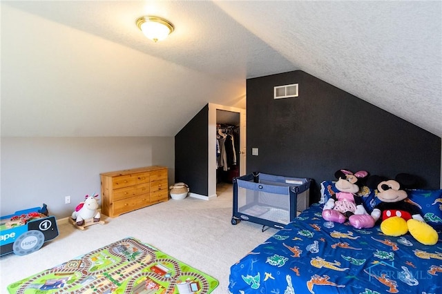7663 Cortland Ct, Holland, OH 43528 - carpeted bedroom featuring vaulted ceiling, a spacious closet, and a closet