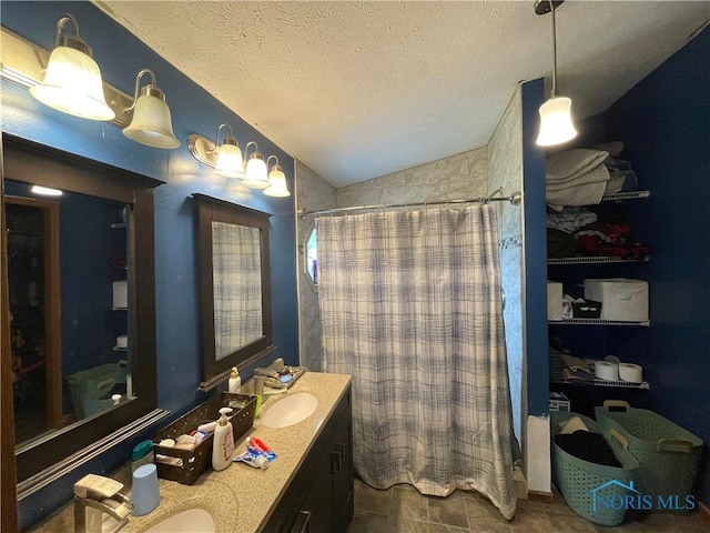 7774 Scott Rd, Edgerton, OH 43517 - bathroom with a shower with shower curtain, vaulted ceiling, double vanity, and a textured ceiling