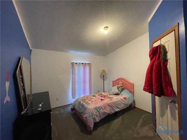 7774 Scott Rd, Edgerton, OH 43517 - carpeted bedroom featuring a textured ceiling