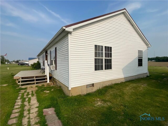 7774 Scott Rd, Edgerton, OH 43517 - view of property exterior with a wooden deck, crawl space, and a yard