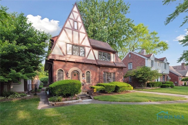 2917 Goddard Rd, Toledo, OH 43606 - tudor house with brick siding
