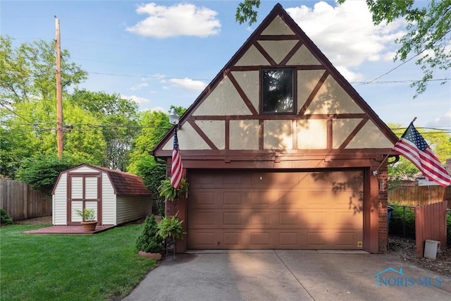 2917 Goddard Rd, Toledo, OH 43606 - garage with a detached garage and a storage unit