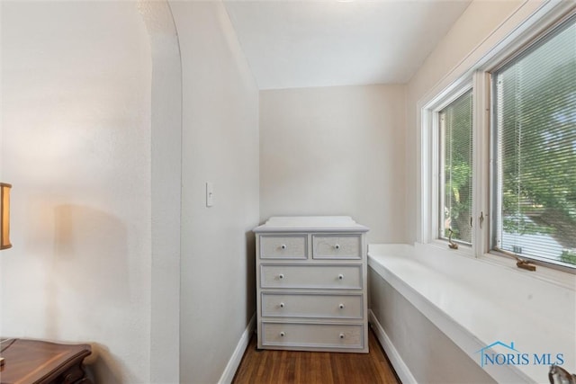 2917 Goddard Rd, Toledo, OH 43606 - interior space featuring dark wood-style flooring and baseboards