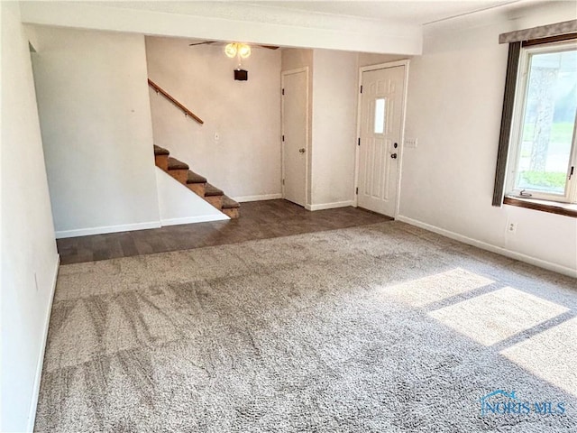 1105 S Lallendorf Rd, Oregon, OH 43616 - entrance foyer featuring carpet flooring and stairs