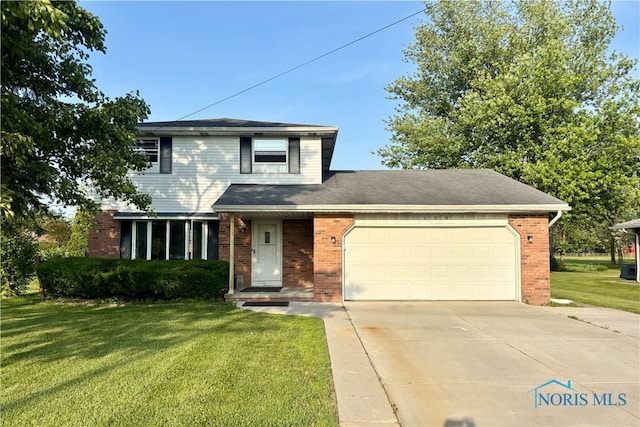 1105 S Lallendorf Rd, Oregon, OH 43616 - traditional-style home with an attached garage, brick siding, driveway, and a front lawn