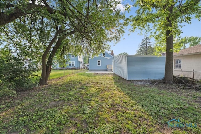 1006 Brookley Blvd, Toledo, OH 43607 - view of yard with an outbuilding and a patio area