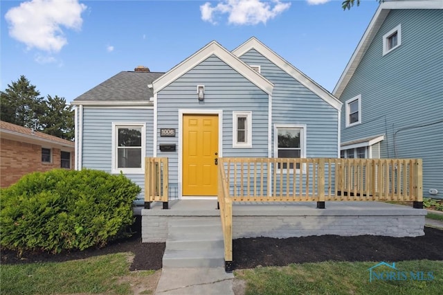 1006 Brookley Blvd, Toledo, OH 43607 - view of front of house with a shingled roof