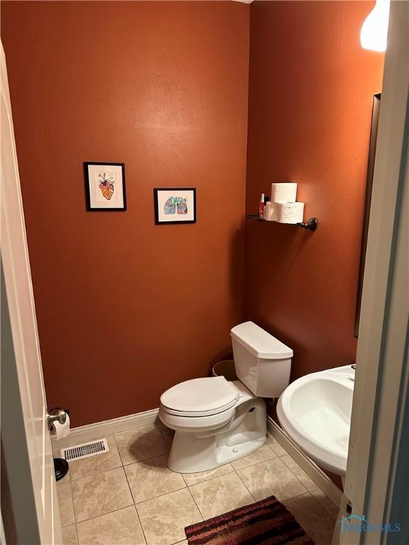 8828 Cedar Bend Rd, Sylvania, OH 43560 - bathroom with a sink and tile patterned flooring