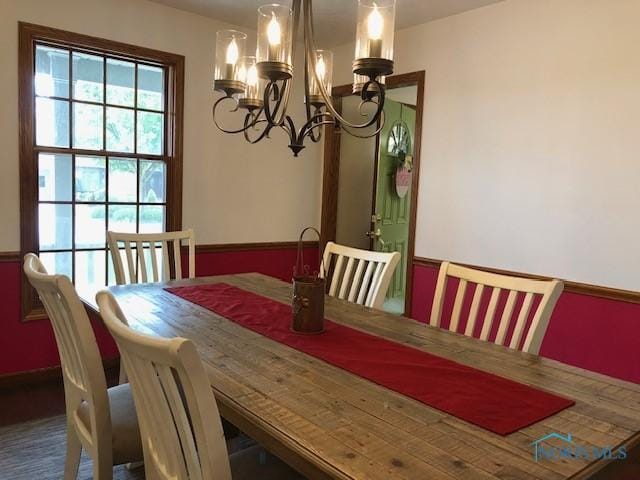 415 W Jamestown Ave, Tiffin, OH 44883 - dining room with a chandelier