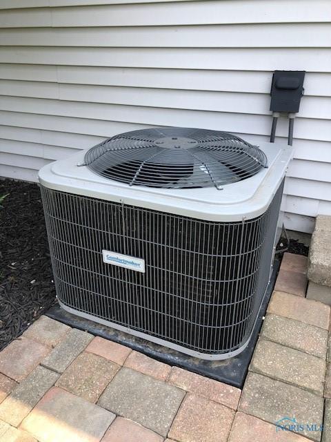 415 W Jamestown Ave, Tiffin, OH 44883 - exterior view of central AC