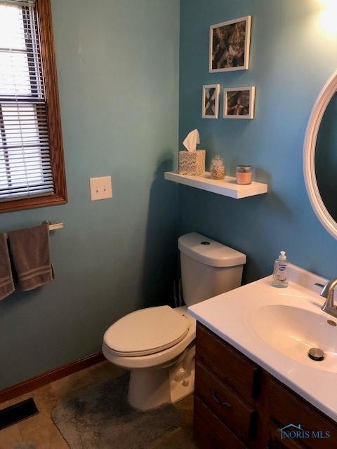 415 W Jamestown Ave, Tiffin, OH 44883 - half bath featuring vanity and toilet