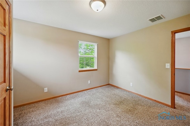 536 N Johnson St, Ada, OH 45810 - carpeted empty room with baseboards