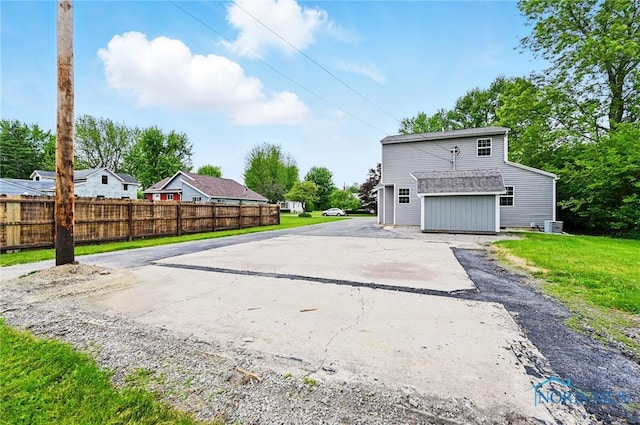 536 N Johnson St, Ada, OH 45810 - rear view of property featuring an outdoor structure and a residential view