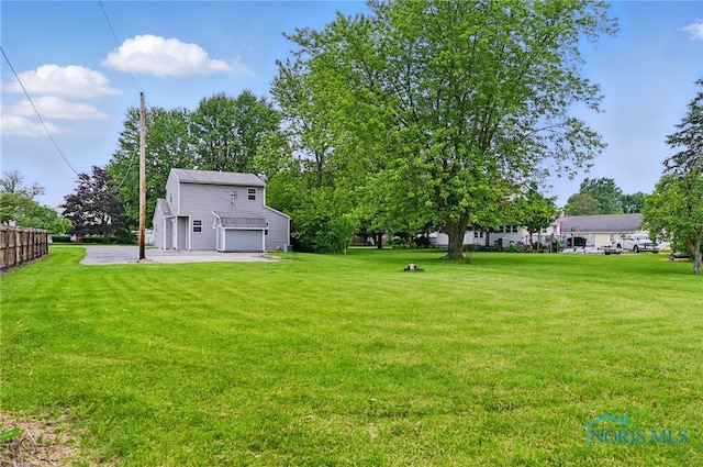 536 N Johnson St, Ada, OH 45810 - view of yard with a detached garage