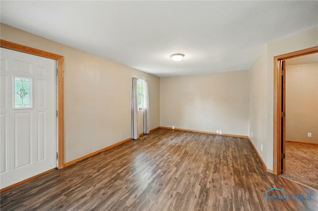 536 N Johnson St, Ada, OH 45810 - spare room featuring wood finished floors and baseboards