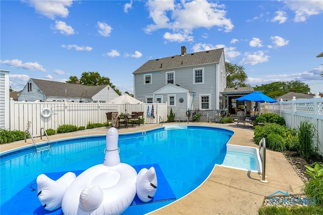 713 N Vine St, Fostoria, OH 44830 - view of swimming pool with outdoor dining space, a fenced backyard, and a patio area