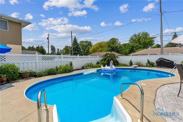 713 N Vine St, Fostoria, OH 44830 - view of pool with a fenced backyard