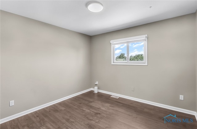 3130 Steeple Chase Ln, Perrysburg, OH 43551 - empty room with baseboards and dark wood-style floors