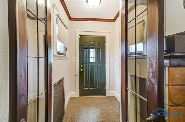 7149 Wales Rd, Northwood, OH 43619 - doorway featuring carpet, baseboards, and ornamental molding