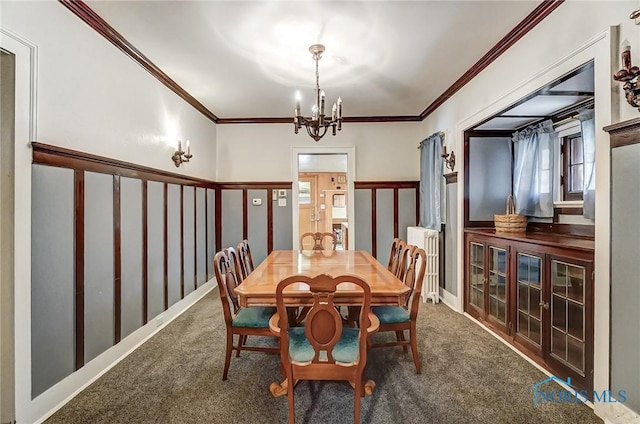 7149 Wales Rd, Northwood, OH 43619 - carpeted dining room featuring a chandelier, ornamental molding, and radiator