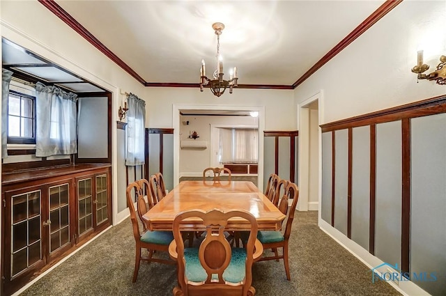 7149 Wales Rd, Northwood, OH 43619 - carpeted dining area featuring a chandelier and ornamental molding