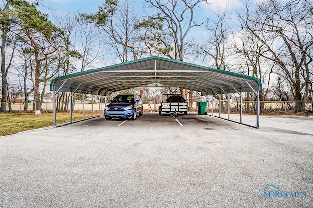 7149 Wales Rd, Northwood, OH 43619 - view of vehicle parking featuring a carport and driveway