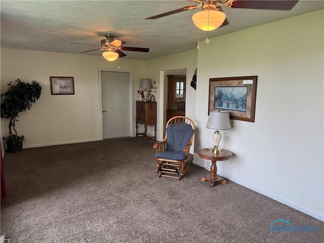 V-437 State Route 108, Napoleon, OH 43545 - living area featuring a ceiling fan, carpet floors, and baseboards
